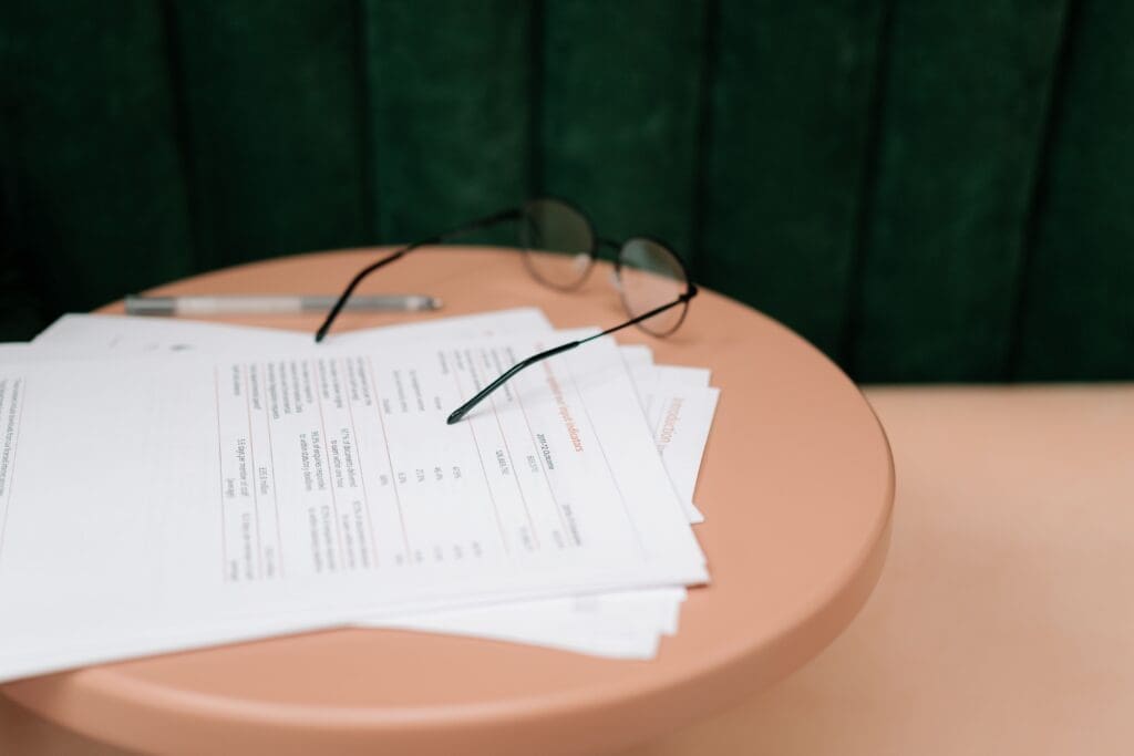 Half-completed CBT thought record worksheet set aside on a table